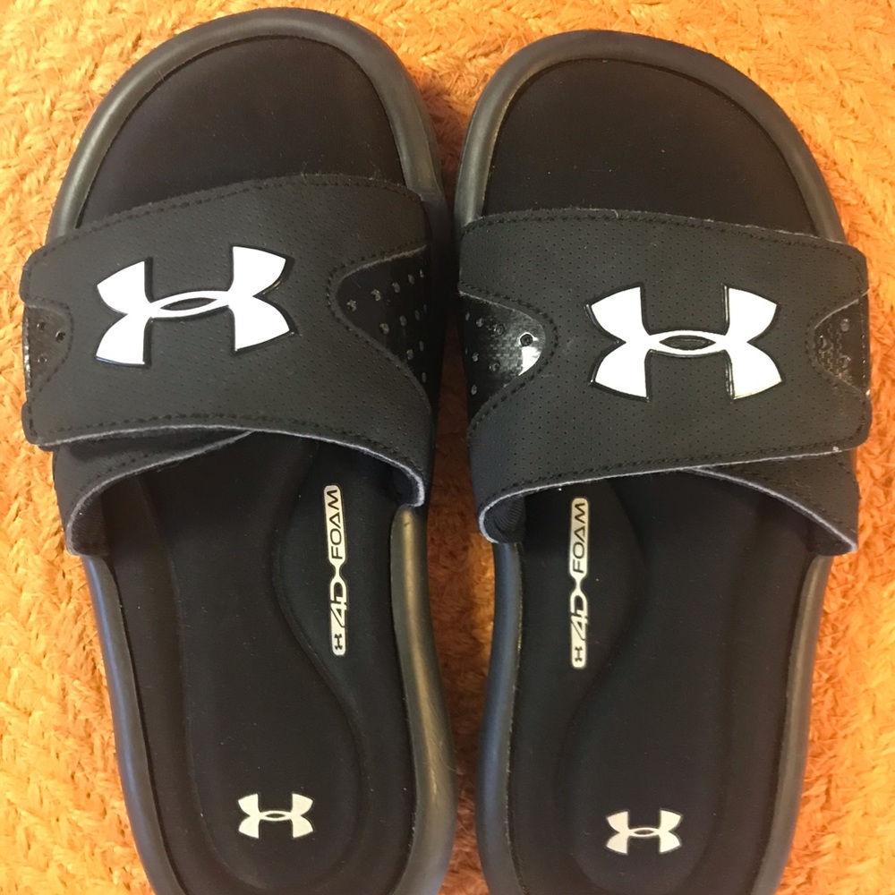 Under Armour slip one . Size 1Y
